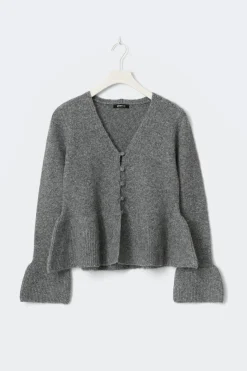 Knitted peplum cardigan