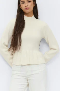 Knitted peplum top
