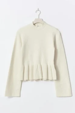 Knitted peplum top