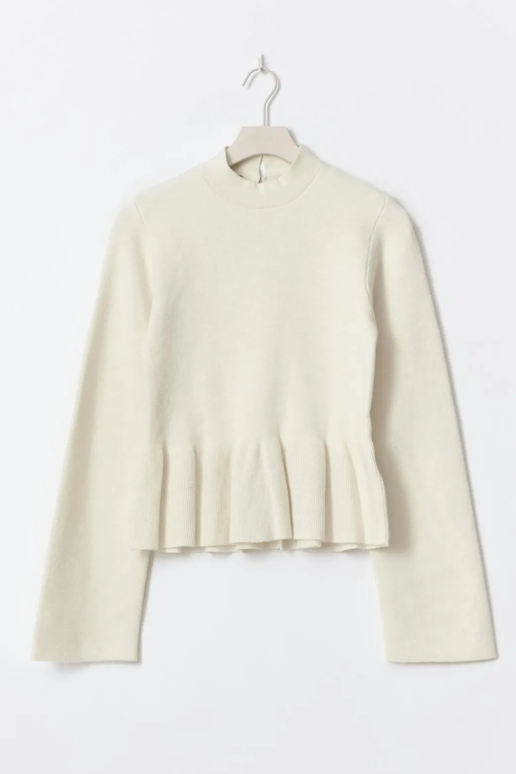Knitted peplum top